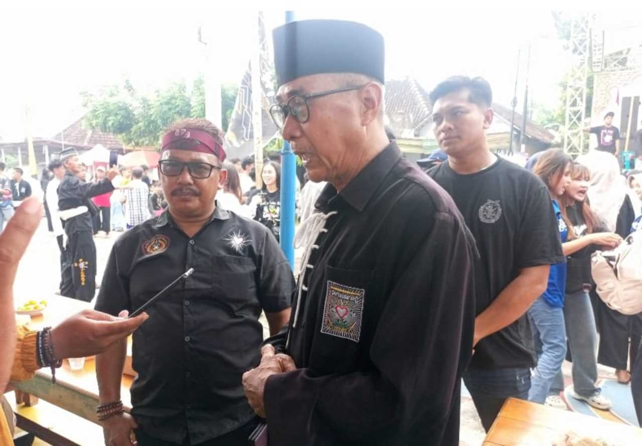 S Agus Triyono Santuni Yatim Piatu dalam Halalbihalal PSHT Rayon Belotan